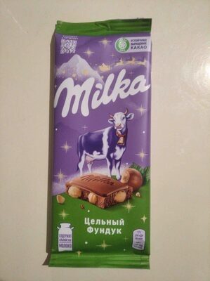 Шоколад молочный "Milka" с цельным фундуком