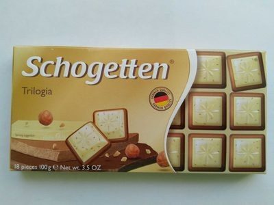 Белый шоколад с грильяжем и лесными орехами, молочный шоколад с джандуей и лесными орехами и молочный шоколад