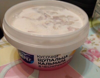 Кусочки щупальца кальмара в чесночном соусе