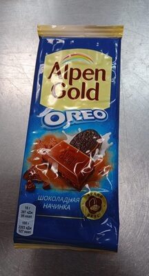Шоколад молочный с шоколадной начинкой и кусочками печенья "ОРЕО"
